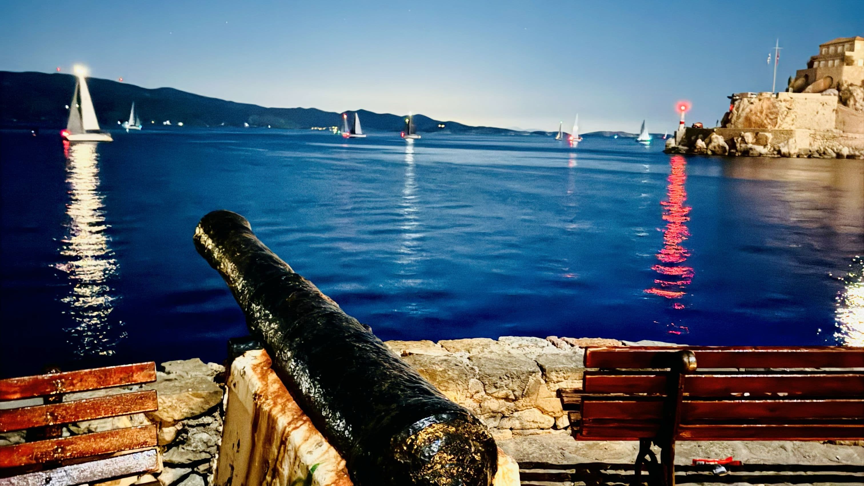 Cannot gun at Hydra - boats finishing the regatta in the distance