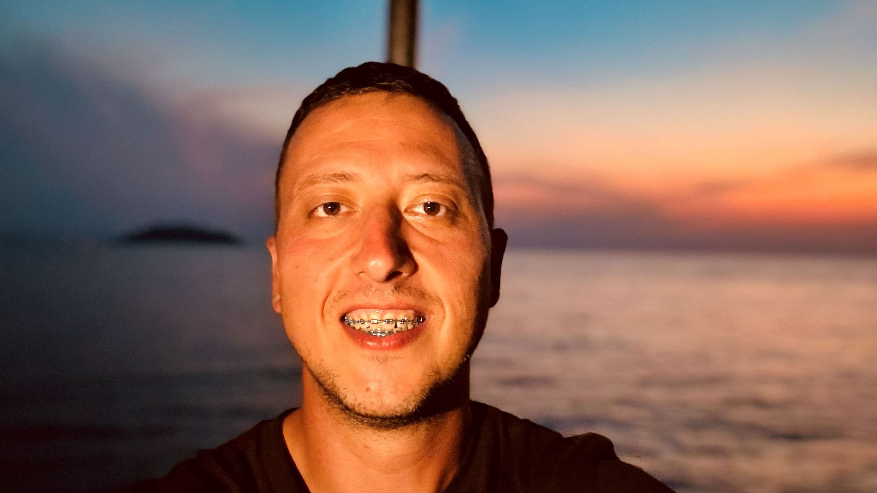 Me on a taxi boat to the Neos Marmaras at dusk