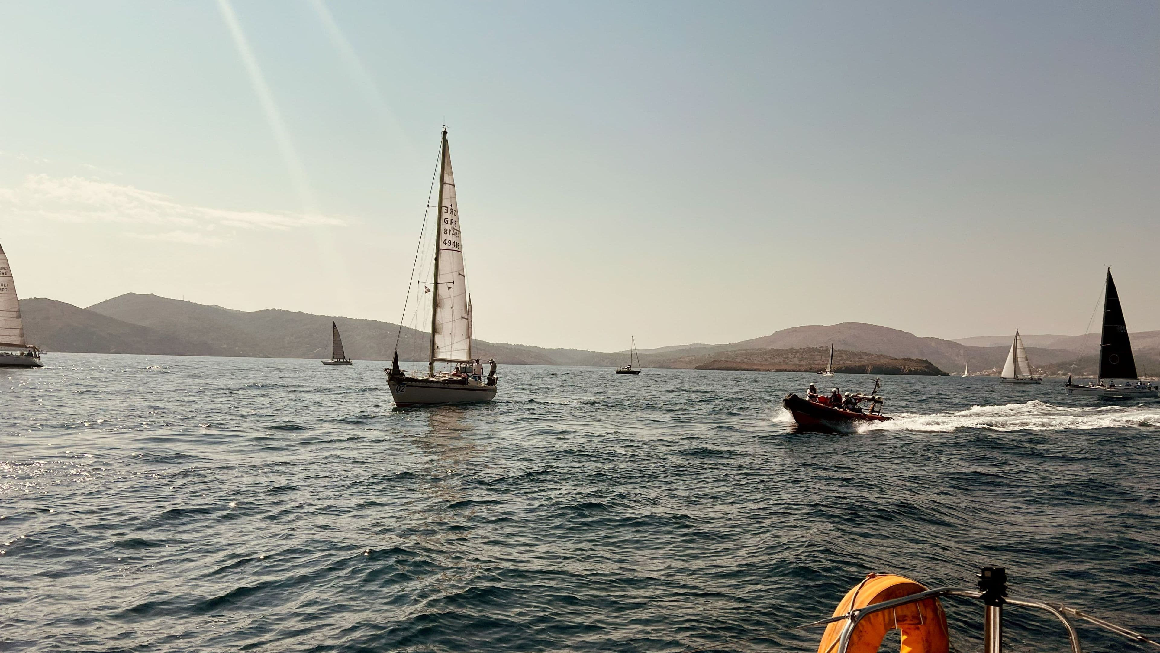 Referees leave to set up the starting line - Aegean Regatta 2023