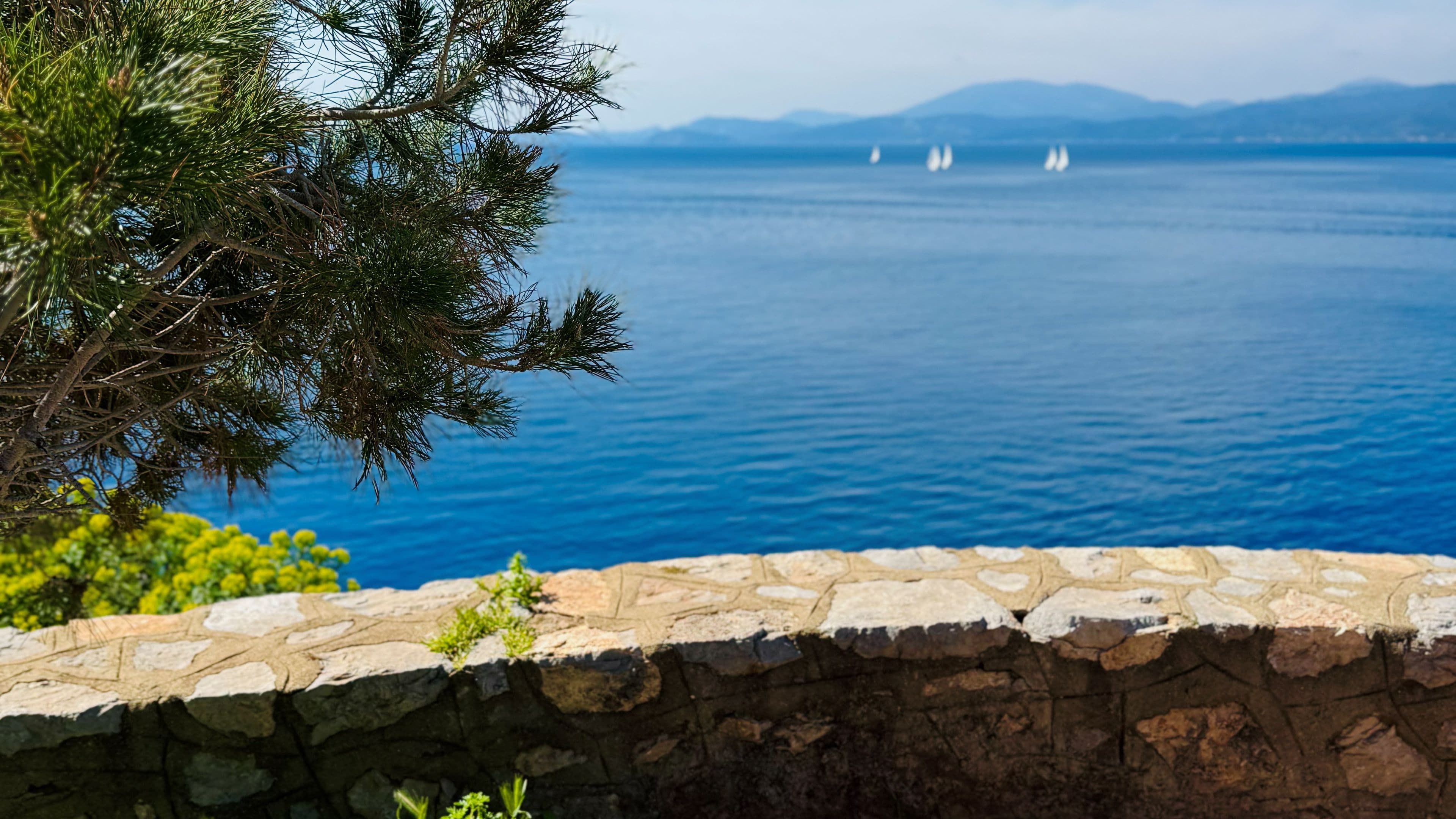 Boats in the distance of Hydra island