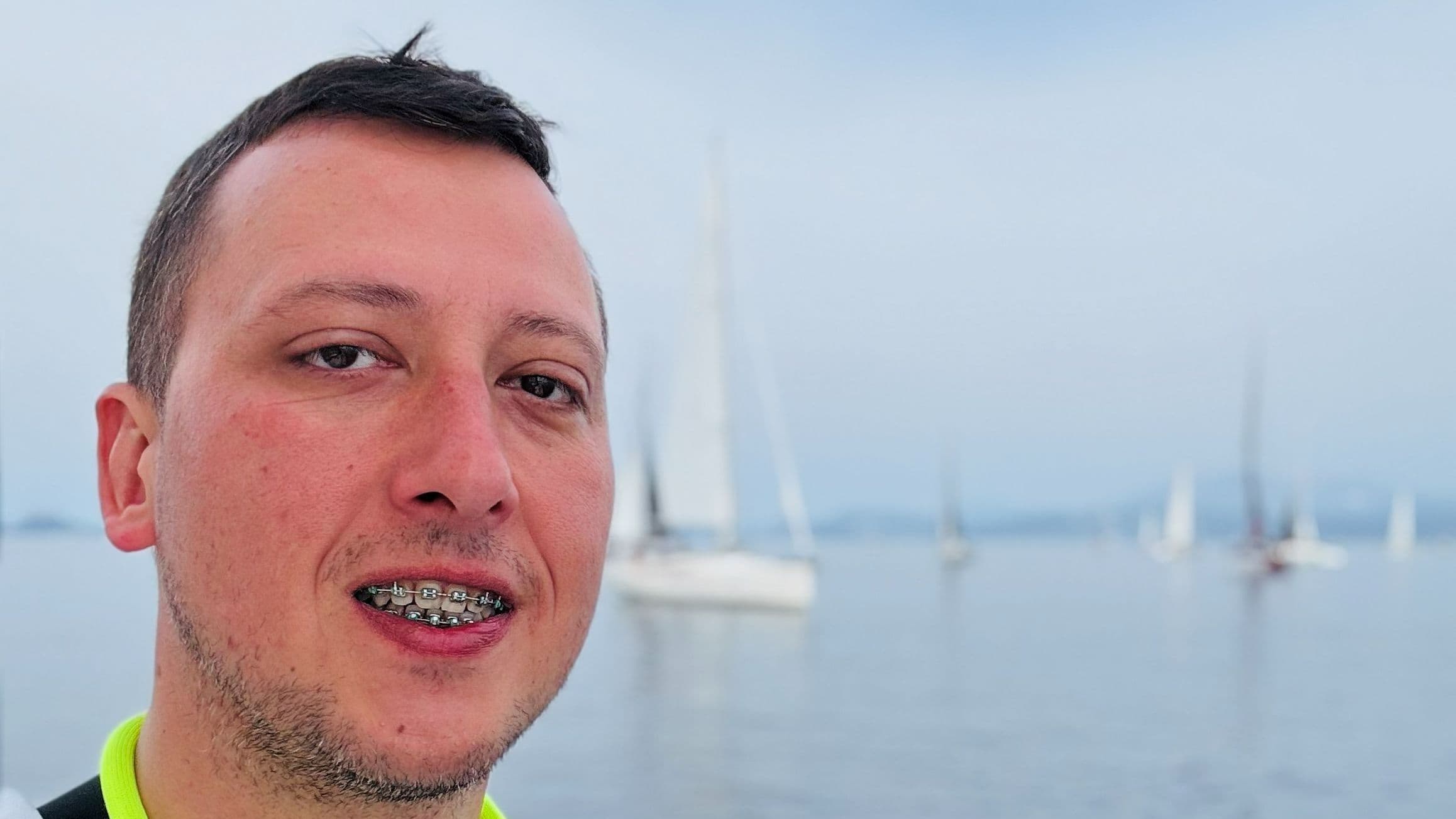 Me posing with the boats in the background - Hydra 2025